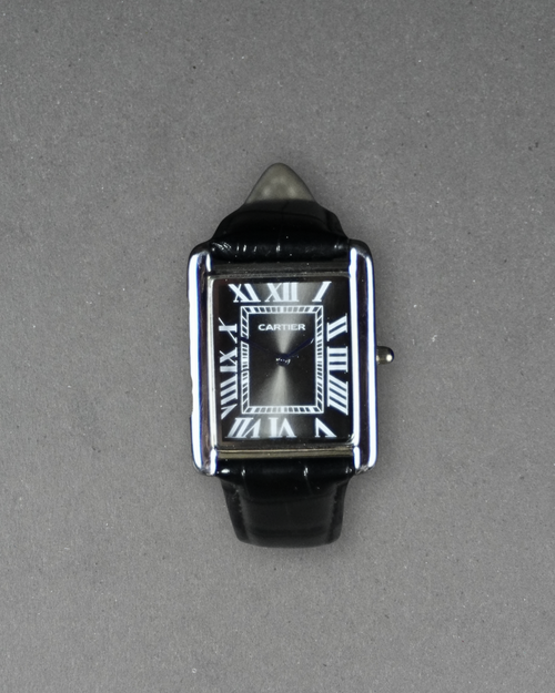Cartier Tank rectangular case with a Roman numeral dial