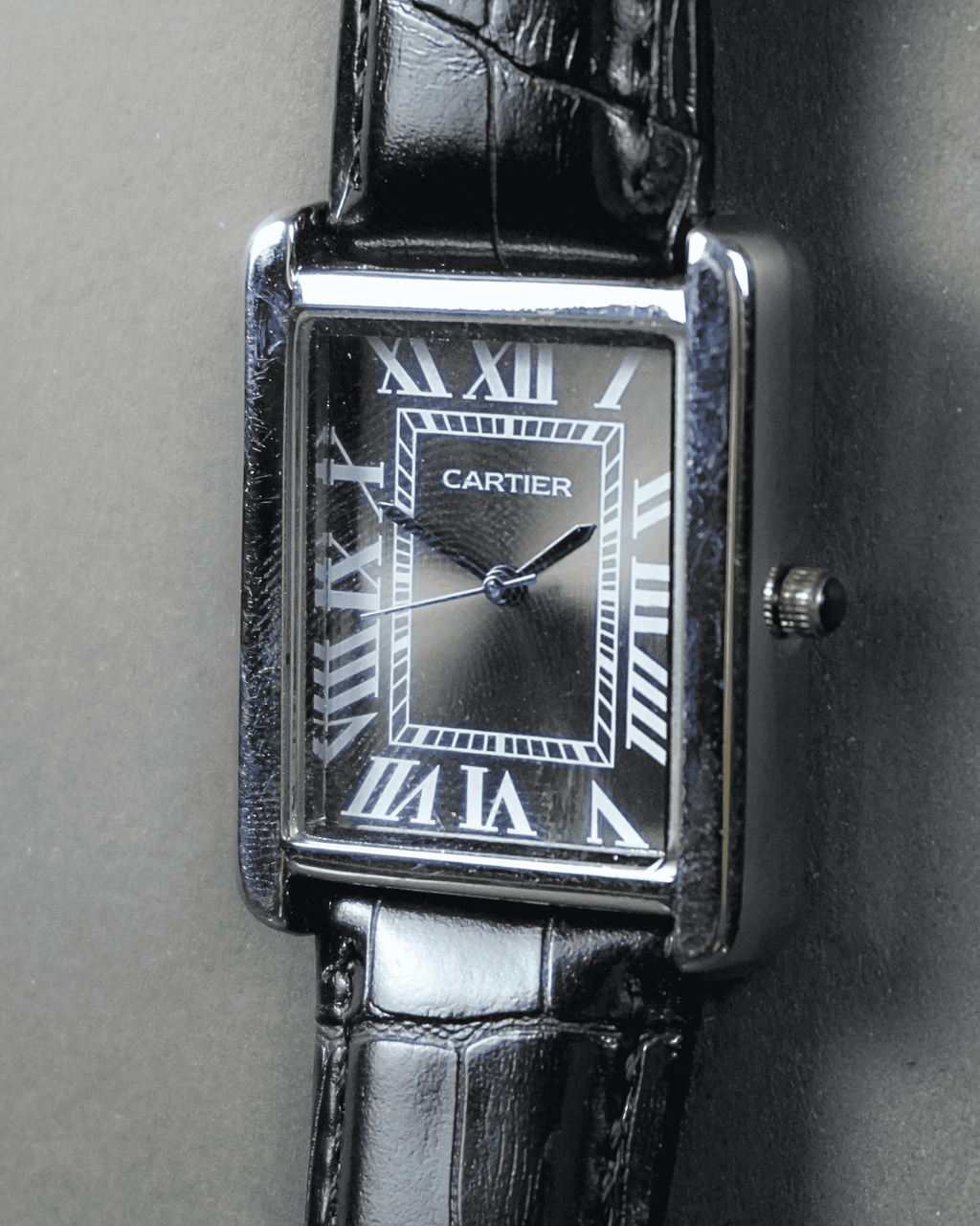 Cartier Tank rectangular case with a Roman numeral dial