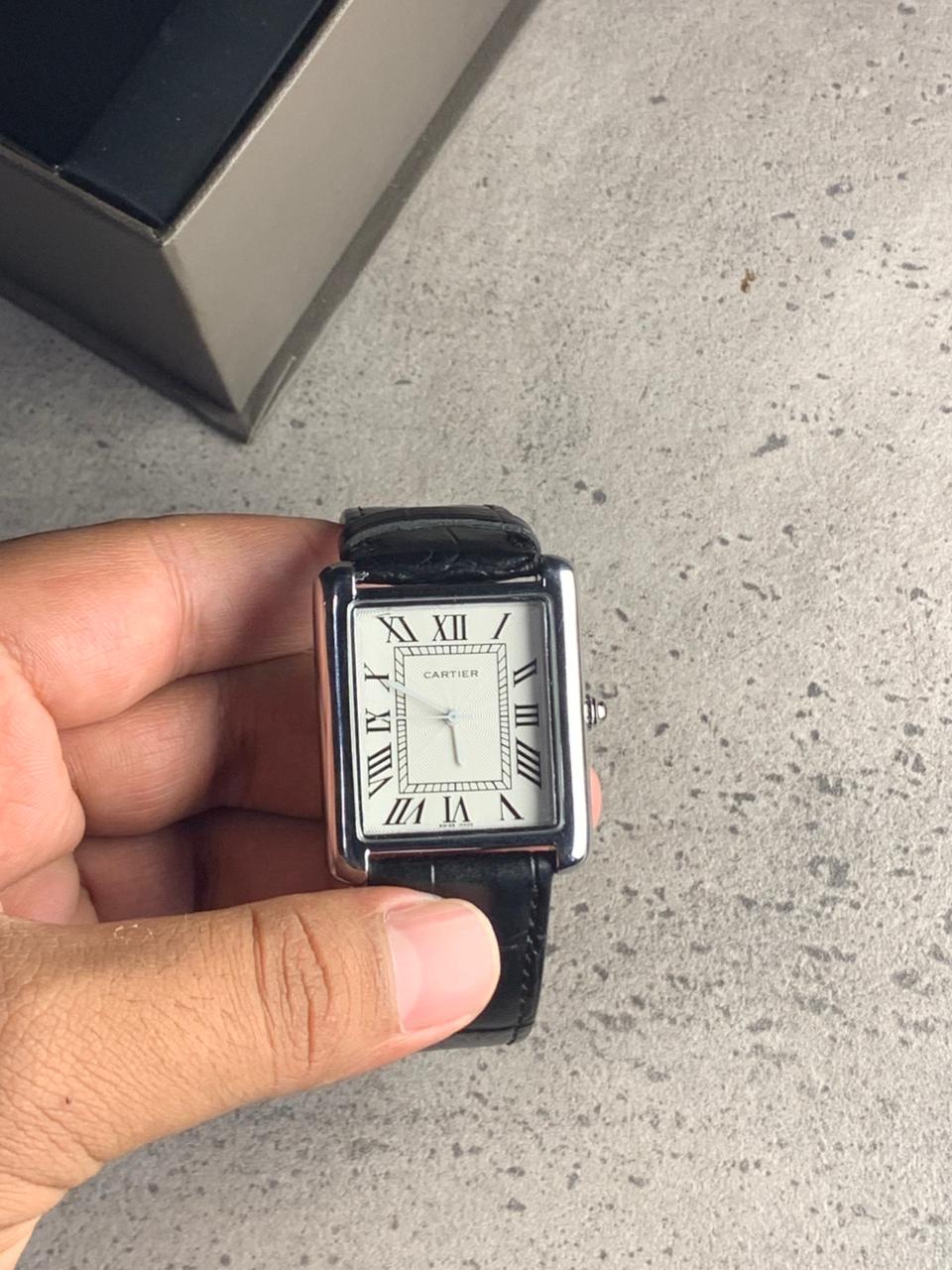 Cartier Tank rectangular case with a Roman numeral dial