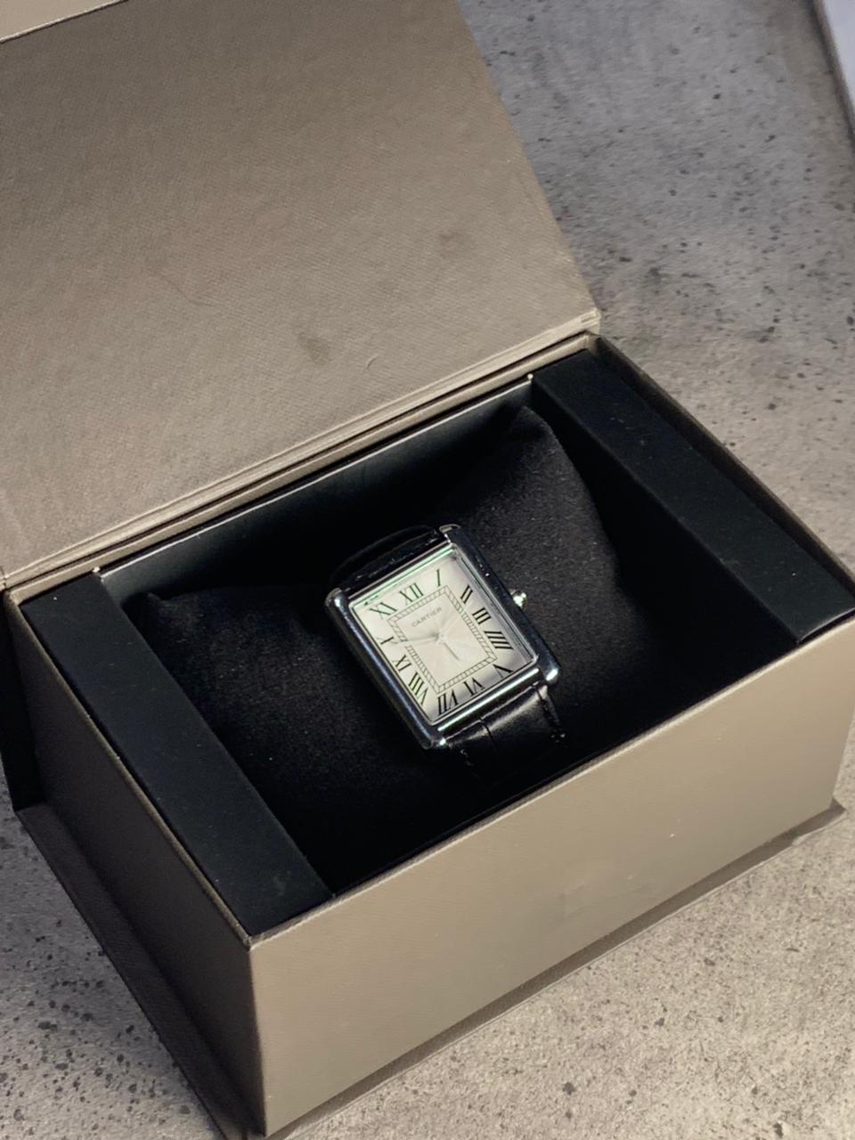 Cartier Tank rectangular case with a Roman numeral dial