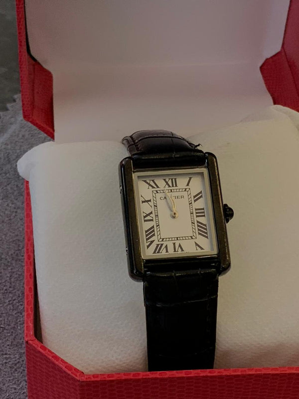 Cartier Tank rectangular case with a Roman numeral dial