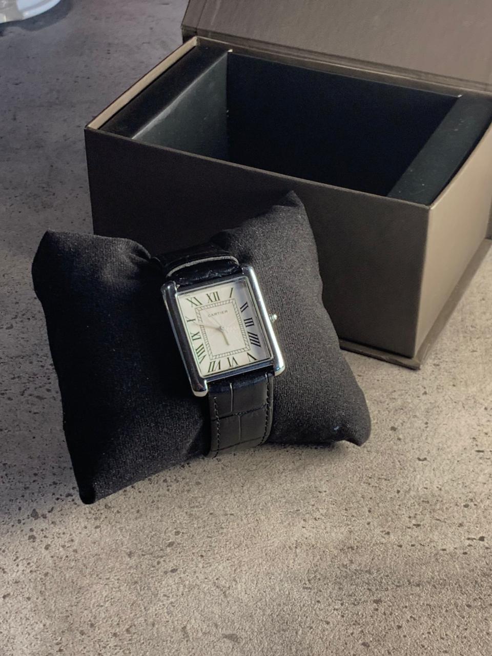 Cartier Tank rectangular case with a Roman numeral dial