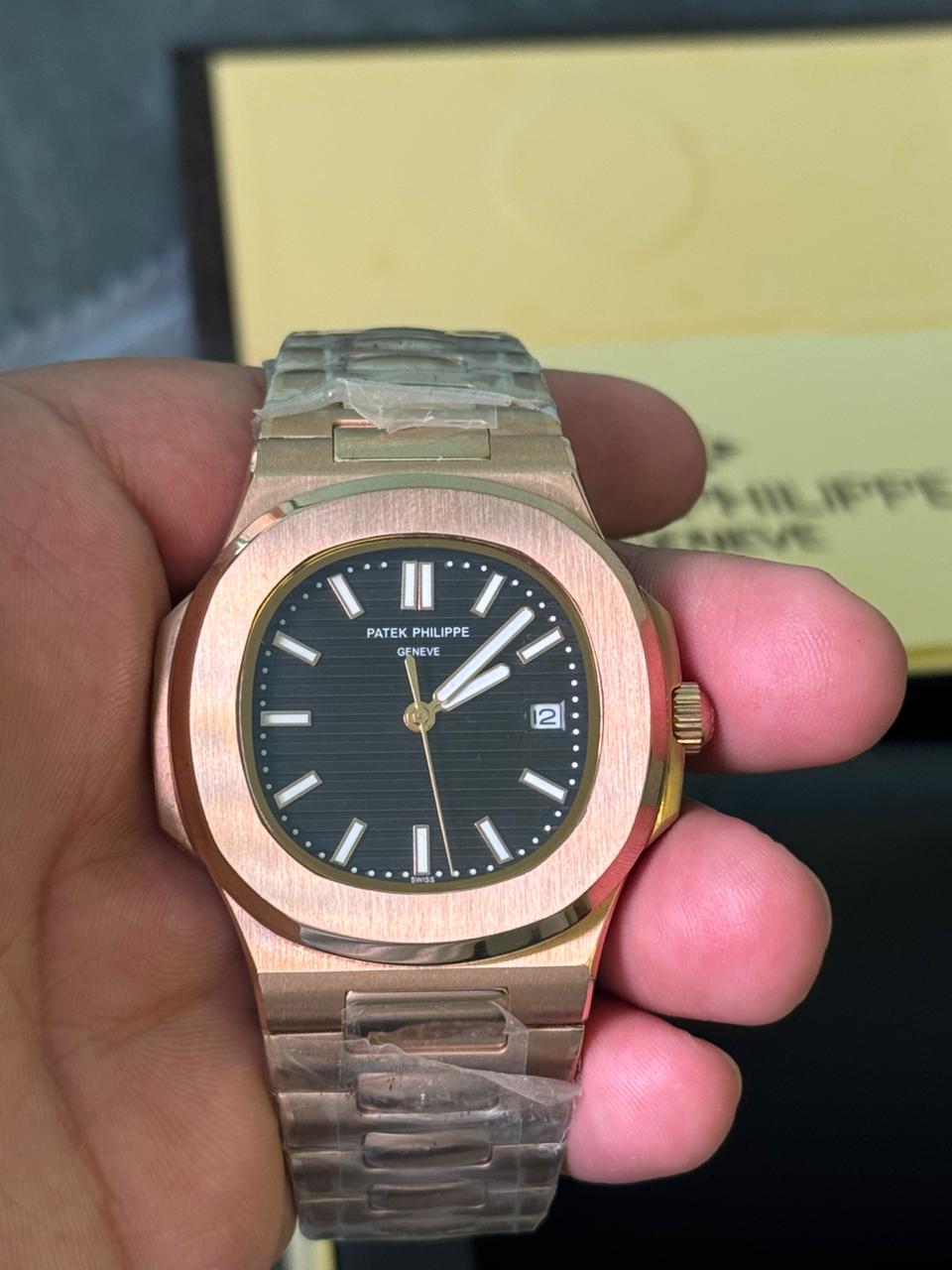 Patek Philippe with a brown gradient dial rose gold chain