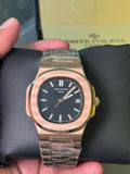 Patek Philippe with a brown gradient dial rose gold chain