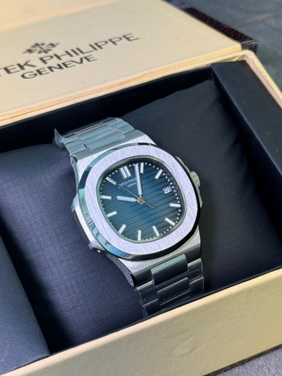 Patek Philippe Nautilus navy blue dial silver chain