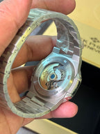 Patek Philippe Nautilus navy blue dial silver chain