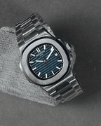Patek Philippe Nautilus navy blue dial silver chain