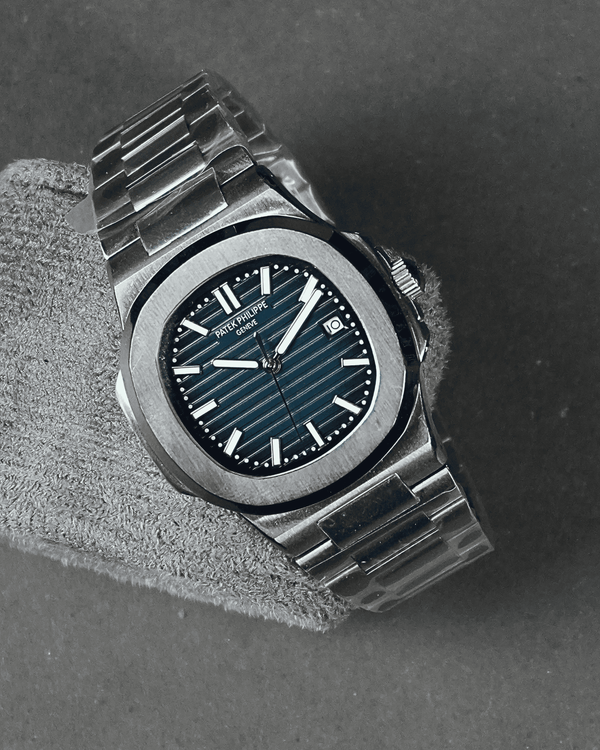 Patek Philippe Nautilus navy blue dial silver chain