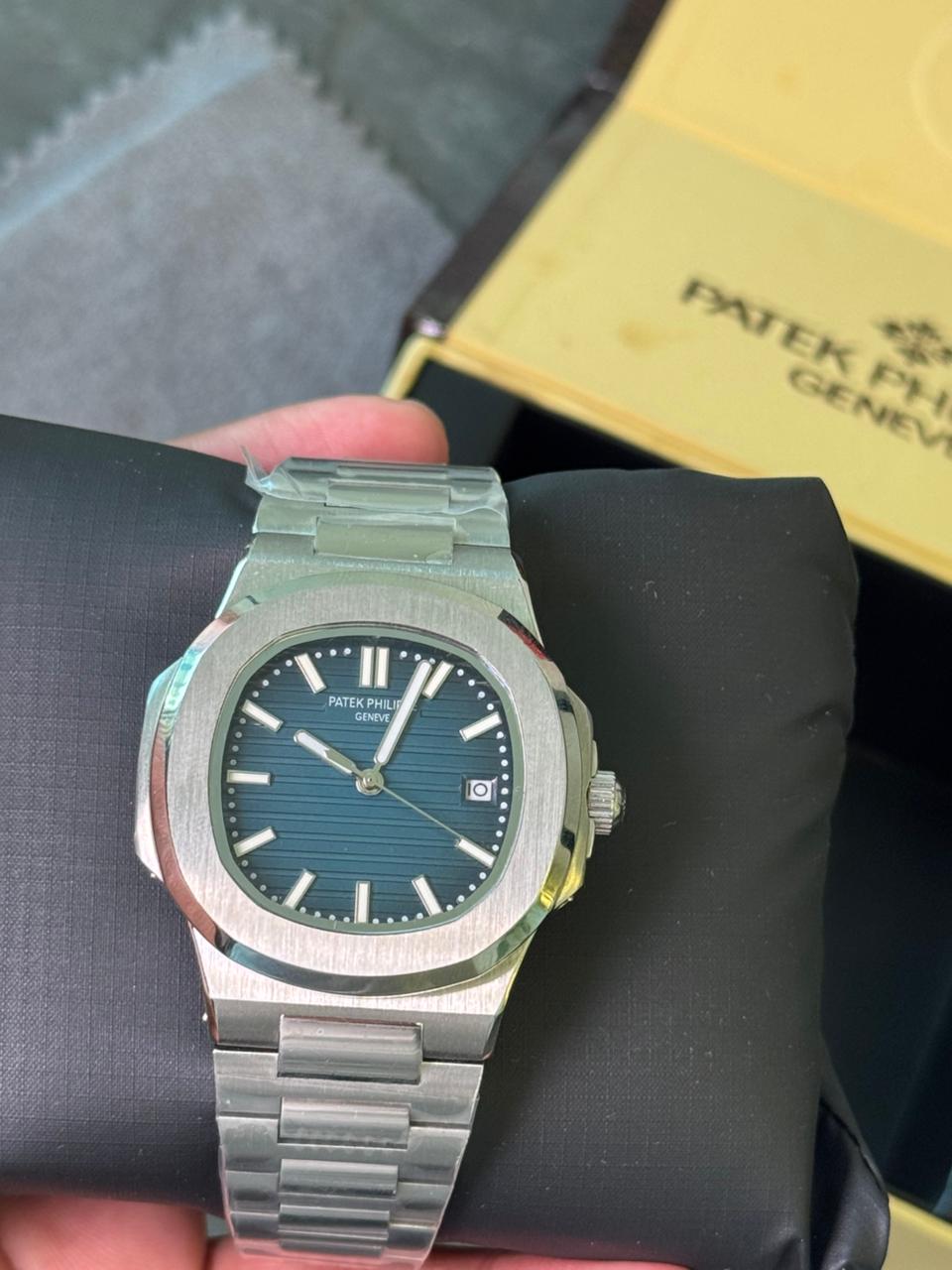 Patek Philippe Nautilus navy blue dial silver chain