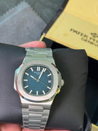 Patek Philippe Nautilus navy blue dial silver chain
