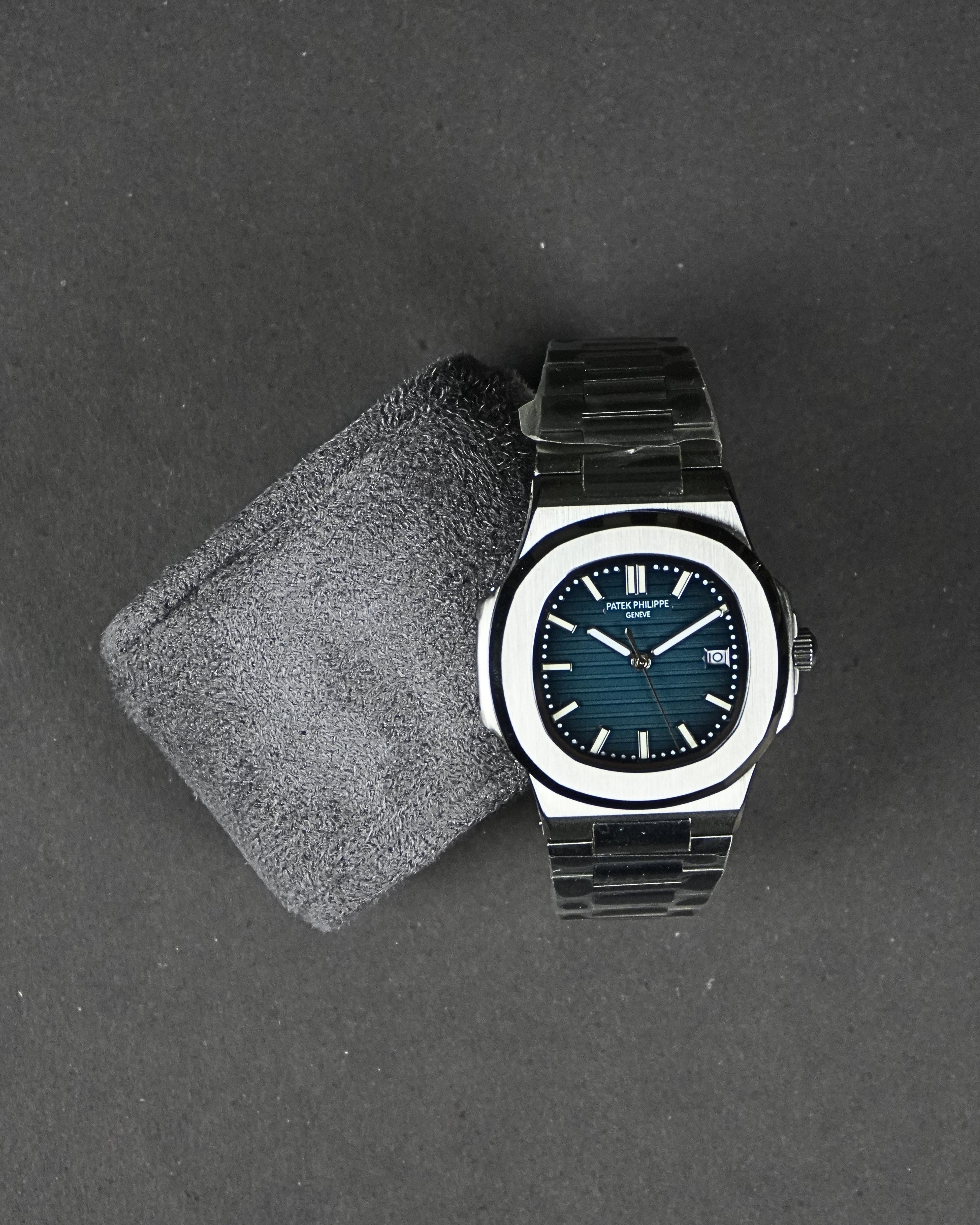 Patek Philippe Nautilus navy blue dial silver chain